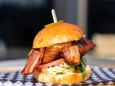 The Hot Nashty: a breaded chicken burger with bacon, coleslaw and a pickle on a brioche bun